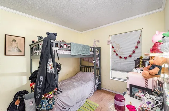 a bed room with a bed and a couch