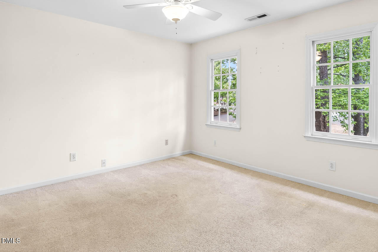 2209 Lodestar Drive Raleigh, NC 27615 - Photo 34 of 50 an empty room with a window