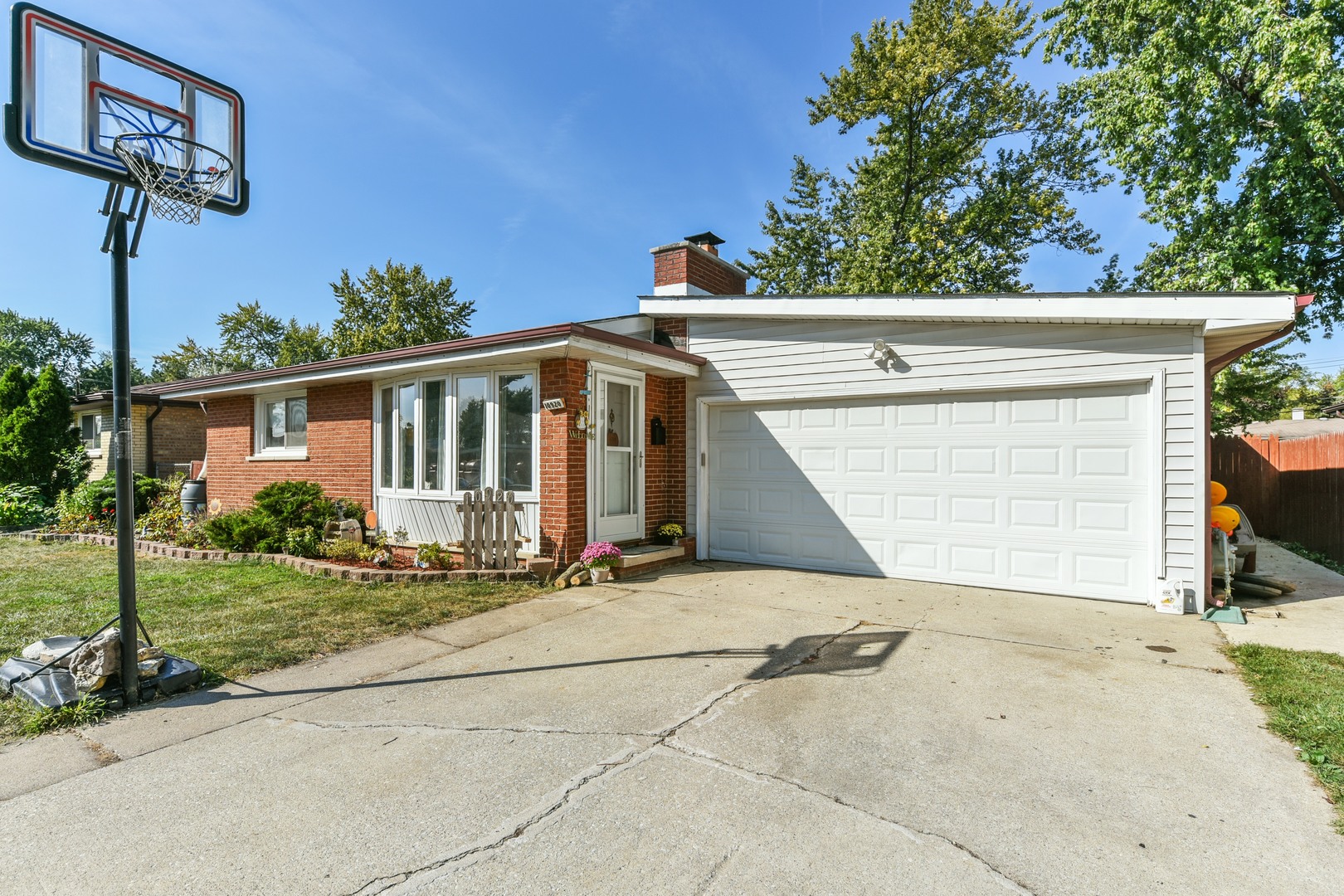 10920 Rutherford Avenue Worth, IL 60482 - Photo 1 of 15 a view of a house with a patio