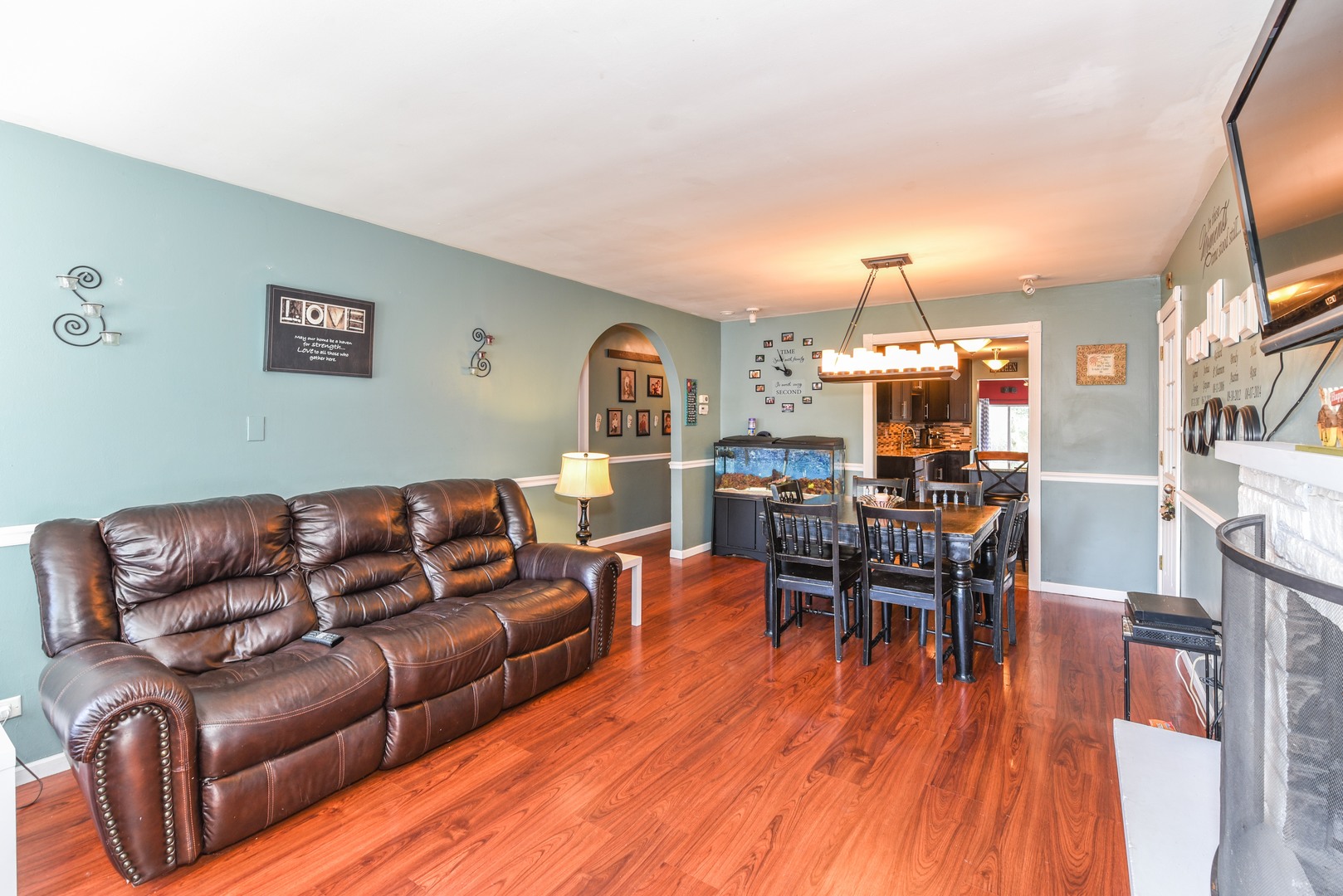 10920 Rutherford Avenue Worth, IL 60482 - Photo 3 of 15 a living room with furniture and a wooden floor