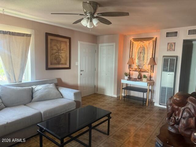 2922 West Fillmore Street Phoenix, AZ 85009 - Photo 5 of 13 a living room with furniture and a window