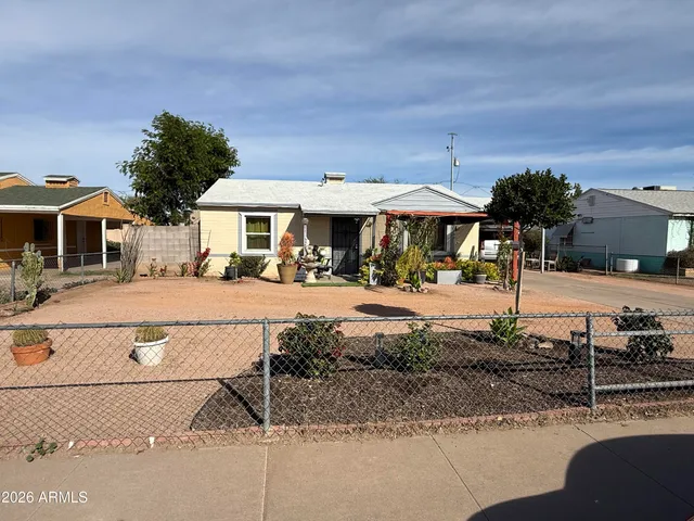 a front view of a building with street view