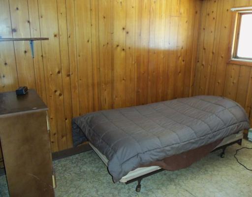 237 Phillips Road Weld, ME 04285 - Photo 11 of 20 Bedroom. Guest house bedroom.