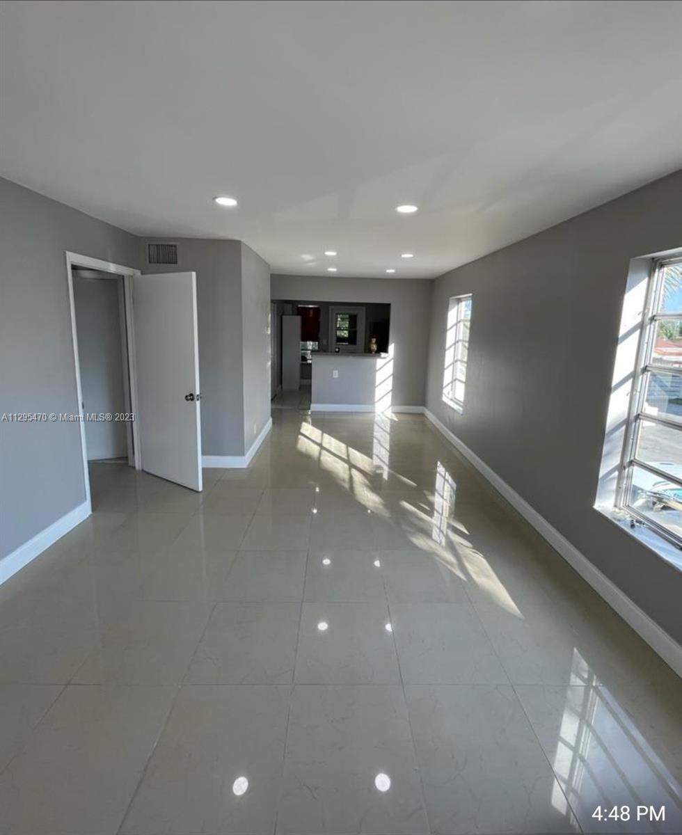 Davie Davie, FL 33024 - Photo 3 of 11 a view of an empty room with a fireplace
