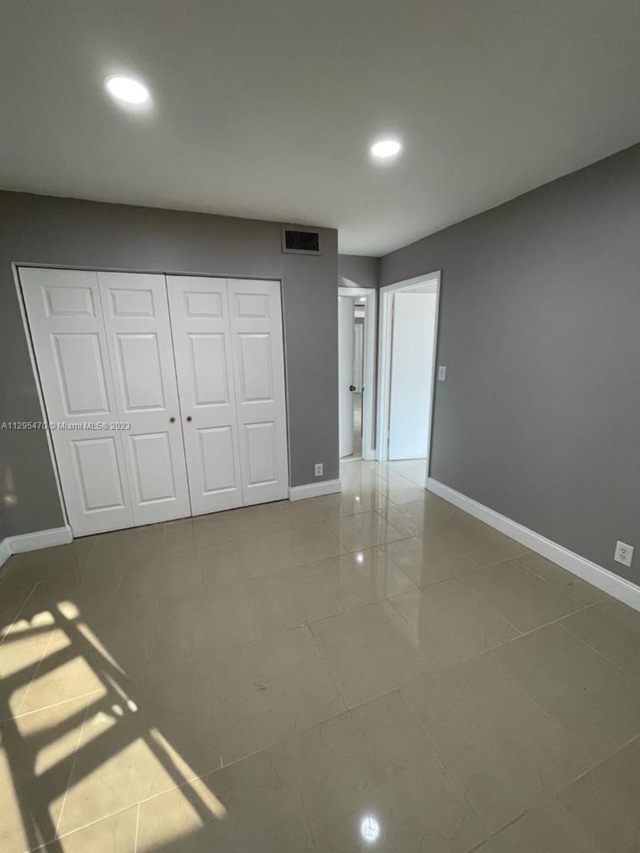 Davie Davie, FL 33024 - Photo 8 of 11 an empty room with a empty space