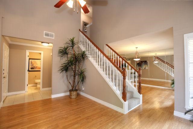 2211 South Kirkwood Road, Unit 59 Houston, TX 77077 - Photo 2 of 16 a view of entryway and hall with wooden floor