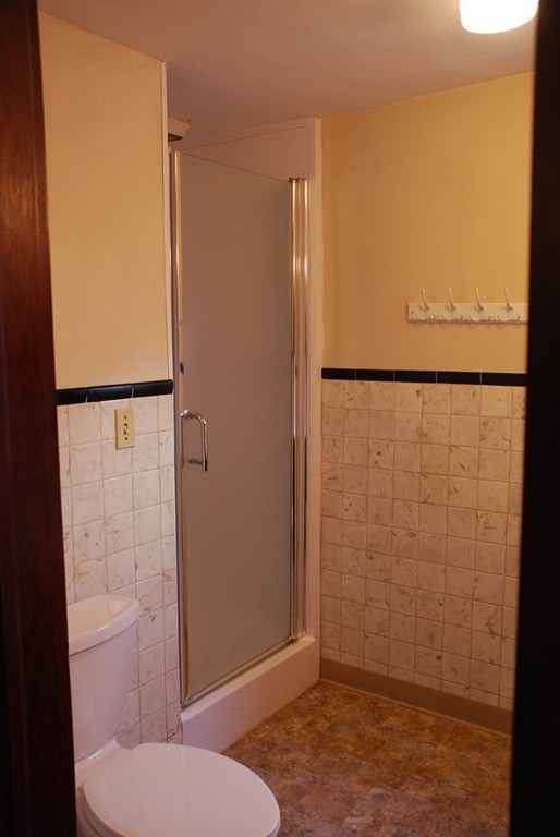 24 Searle Road Huntington, MA 01050 - Photo 11 of 22 a bathroom with a granite countertop sink and a toilet