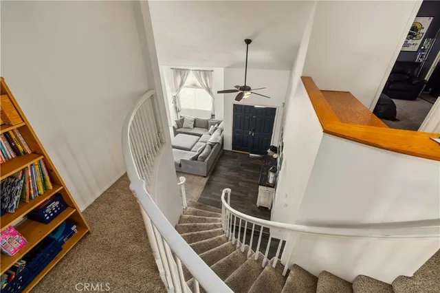 a view of an entryway with wooden floor