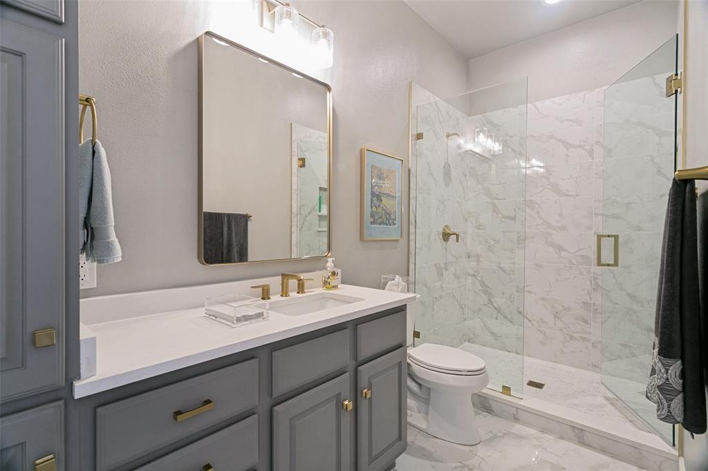 610 Via Ravello, Unit 406 Irving, TX 75039 - Photo 20 of 25 Second bedroom has a full ensuite bathroom