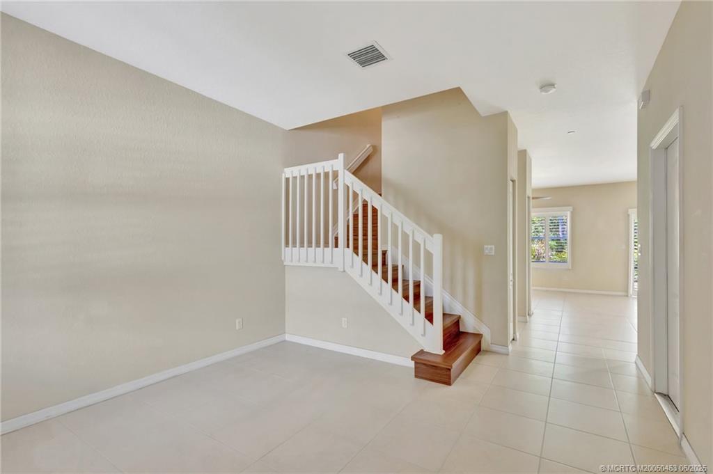 144 Southwest Otter Run Place Stuart, FL 34997 - Photo 14 of 20 a view of an entryway with staircase