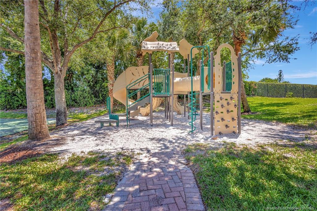144 Southwest Otter Run Place Stuart, FL 34997 - Photo 18 of 20 a view of a park with large trees
