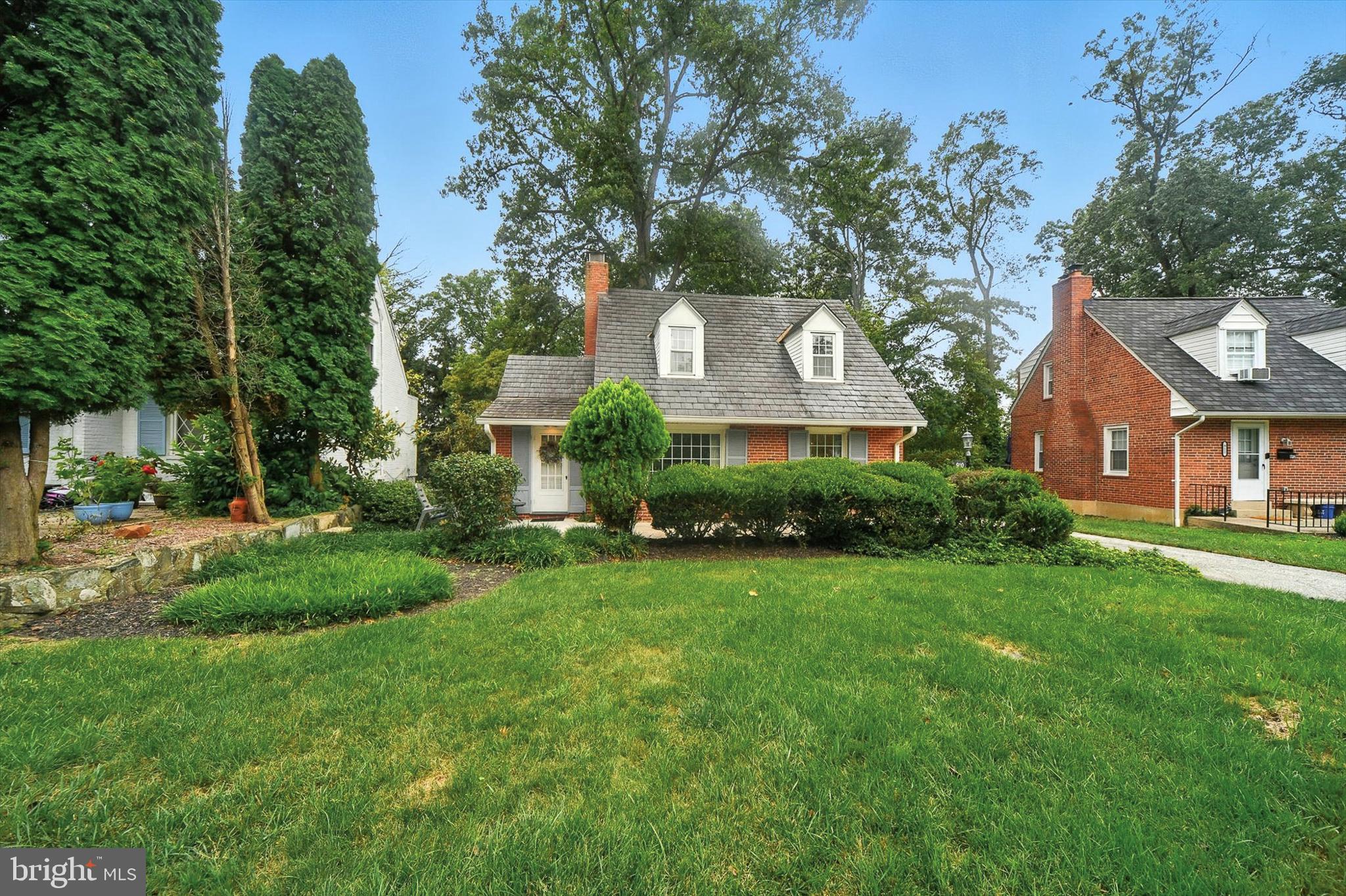 910 Adana Road Baltimore, MD 21208 - Photo 16 of 31 a front view of a house with a yard
