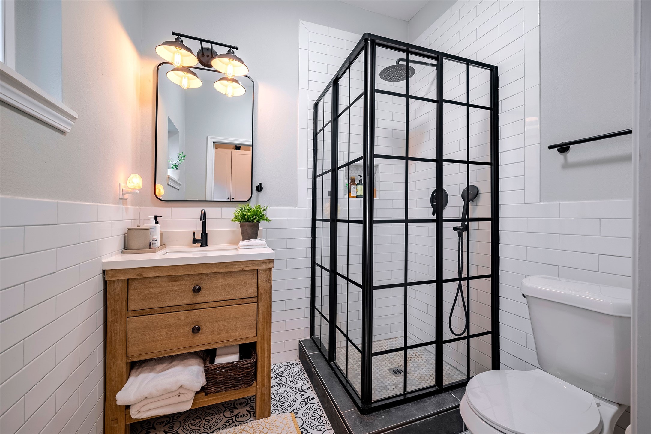 1924 Gano Street Houston, TX 77009 - Photo 17 of 18 a bathroom with a sink toilet and shower