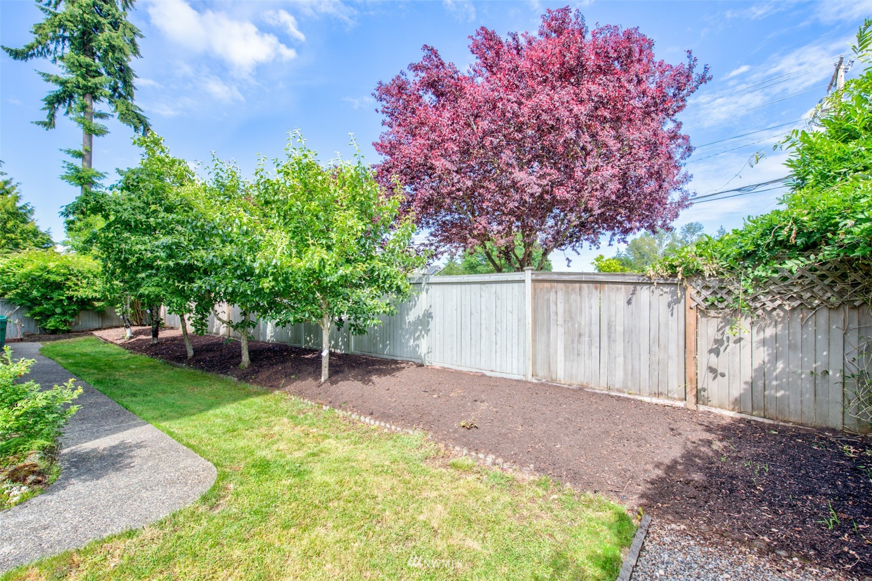 21112 39th Avenue Southeast Bothell, WA 98021 - Photo 31 of 33 a backyard of a house with lots of green space