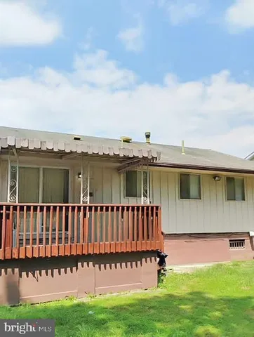 a view of a house with a roof deck