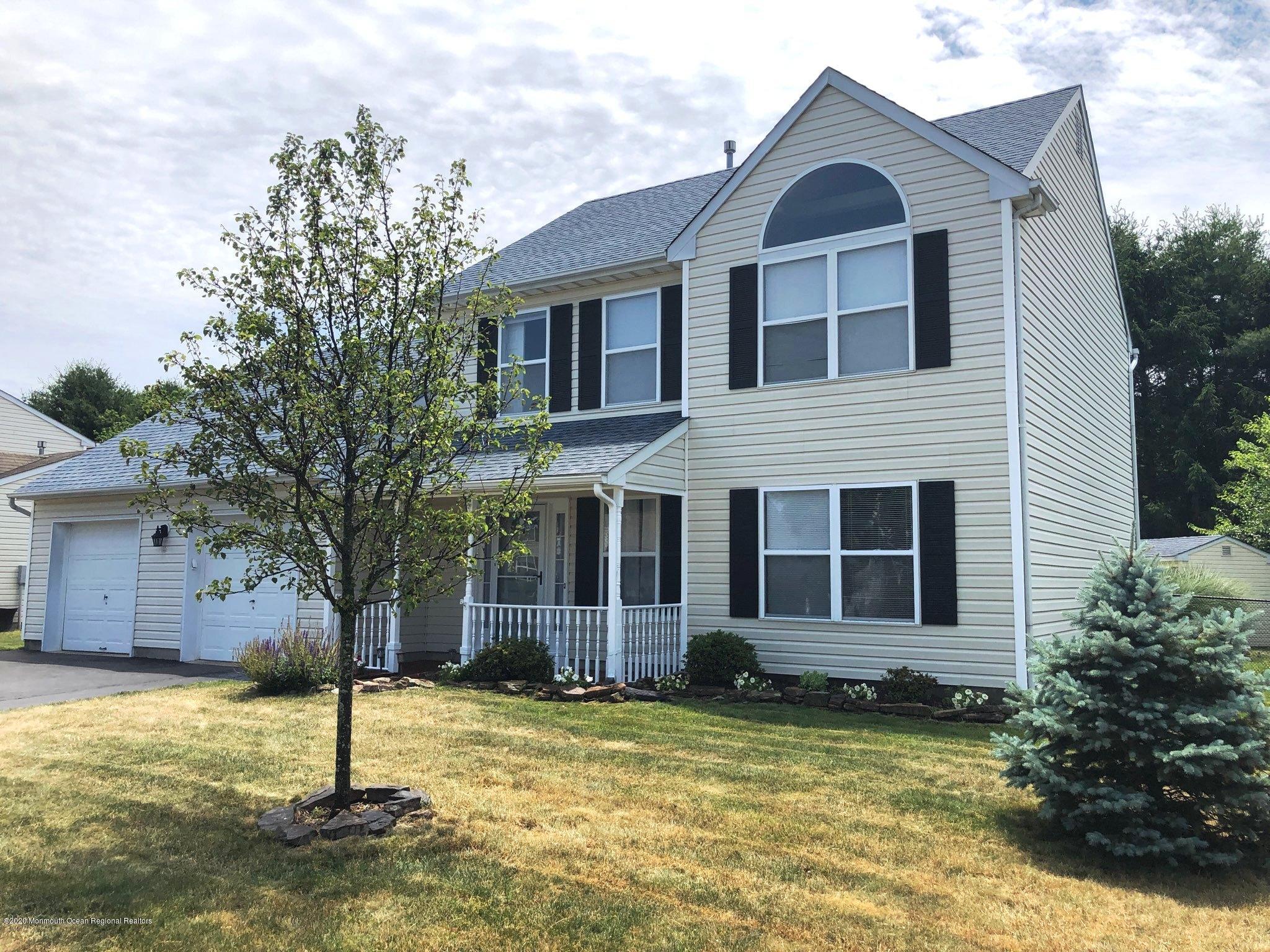 23 Crater Lake Road Howell, NJ 07731 - Photo 2 of 34 a view of a house with a yard