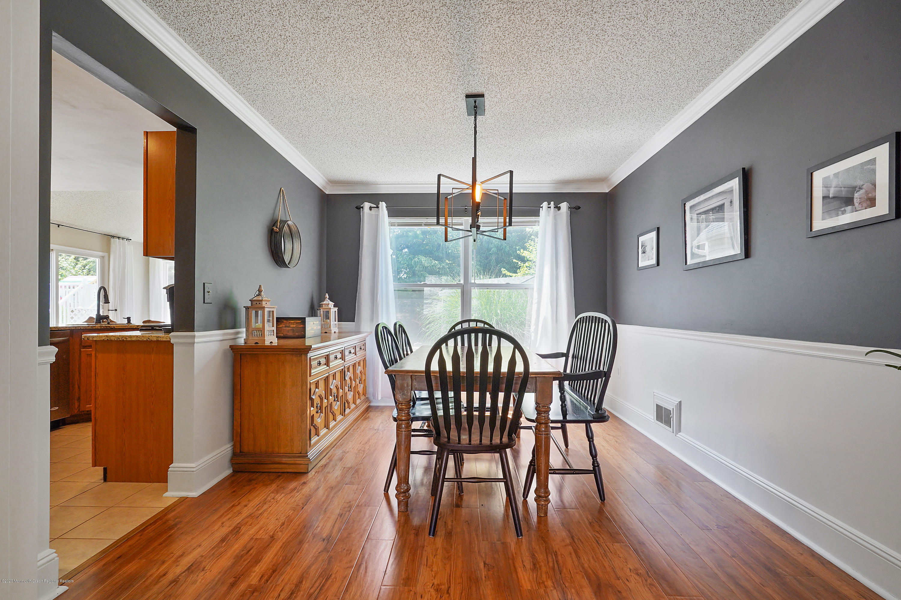 23 Crater Lake Road Howell, NJ 07731 - Photo 11 of 34 a view of a dining room with furniture window and wooden floor