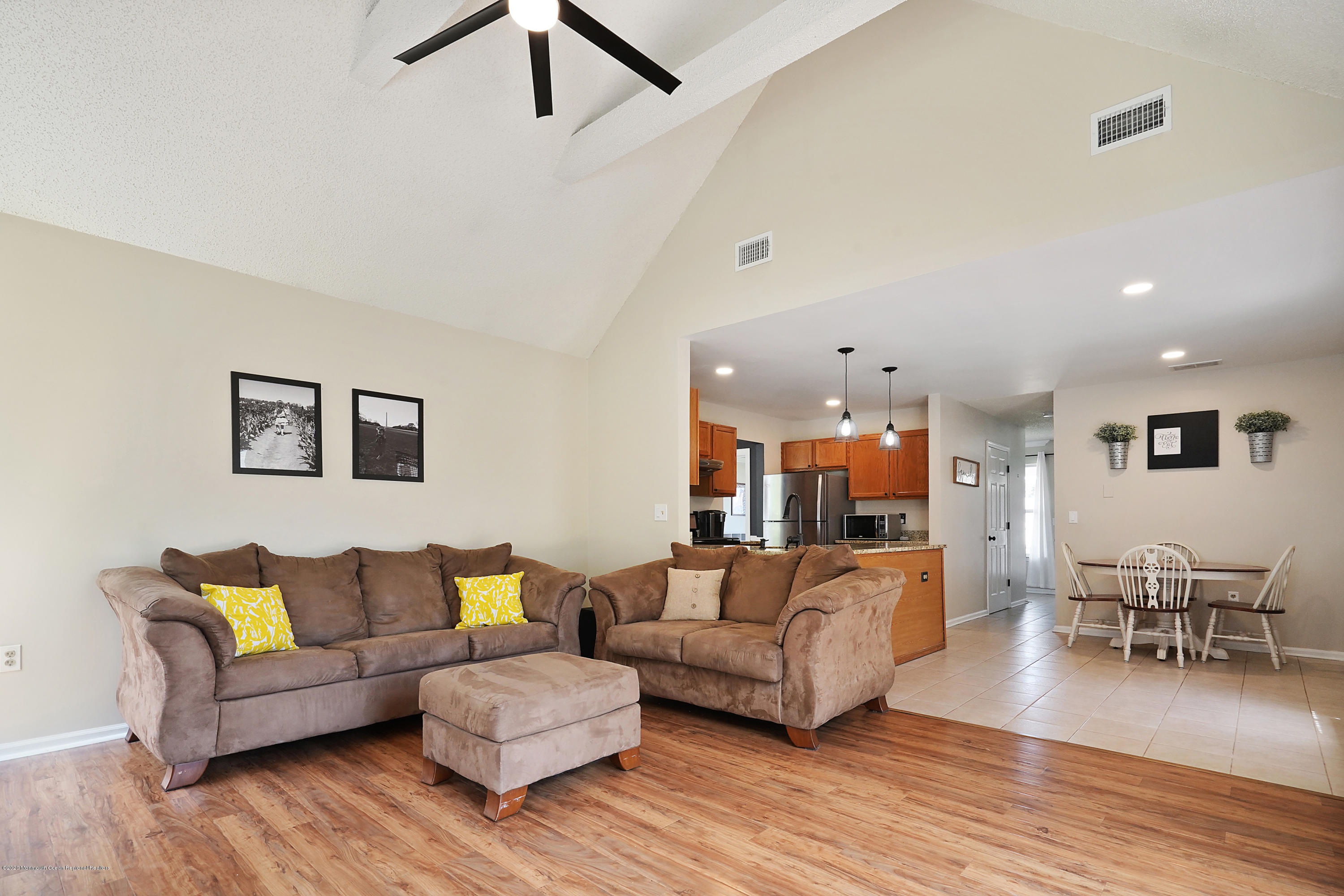 23 Crater Lake Road Howell, NJ 07731 - Photo 17 of 34 a living room with furniture and a wooden floor