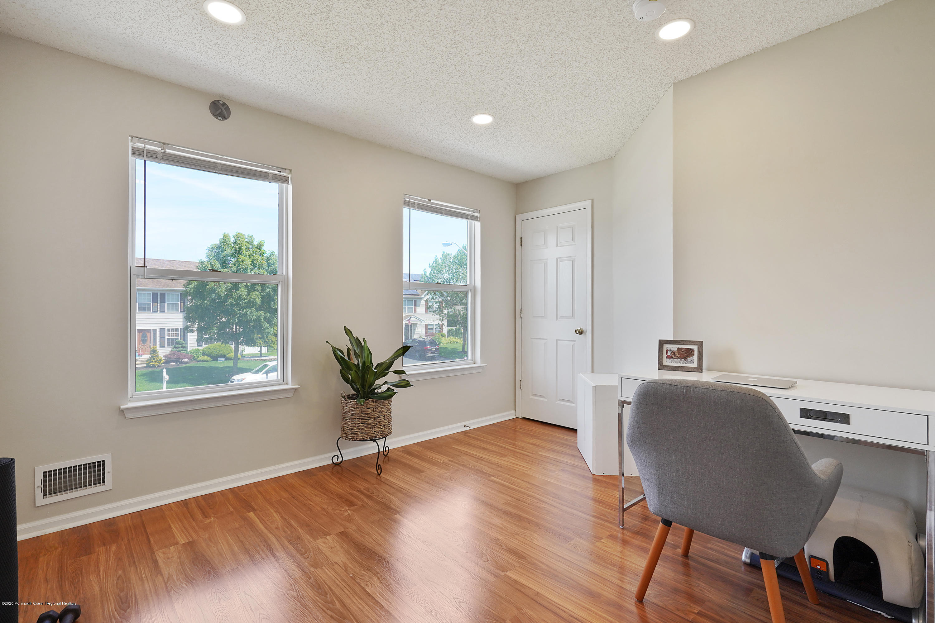 23 Crater Lake Road Howell, NJ 07731 - Photo 24 of 34 a living room with furniture and a window