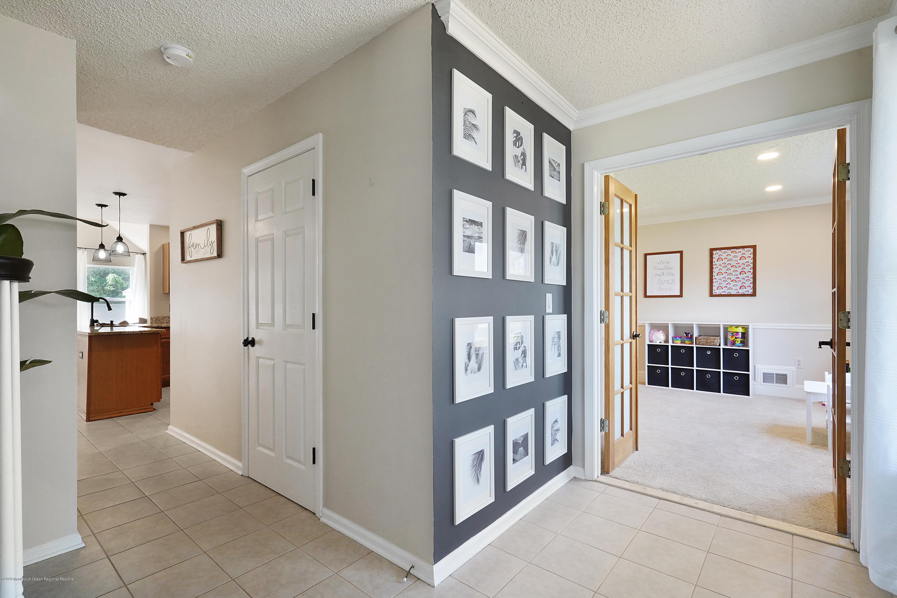 23 Crater Lake Road Howell, NJ 07731 - Photo 7 of 34 a view of a big room with windows and stairs