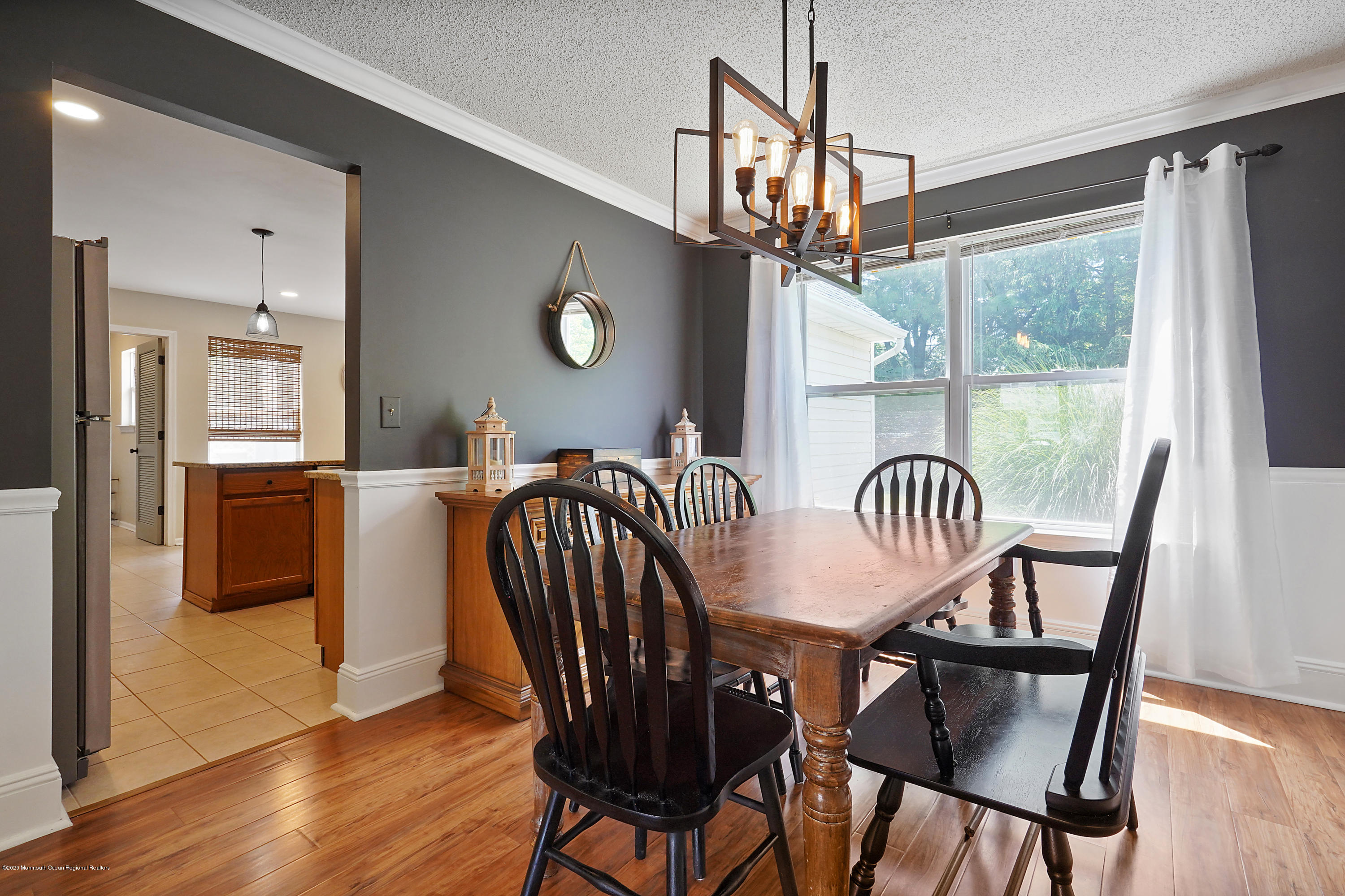 23 Crater Lake Road Howell, NJ 07731 - Photo 10 of 34 a view of a dining room with furniture window and wooden floor
