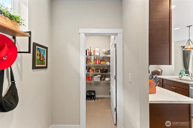 a view of a hallway with workspace