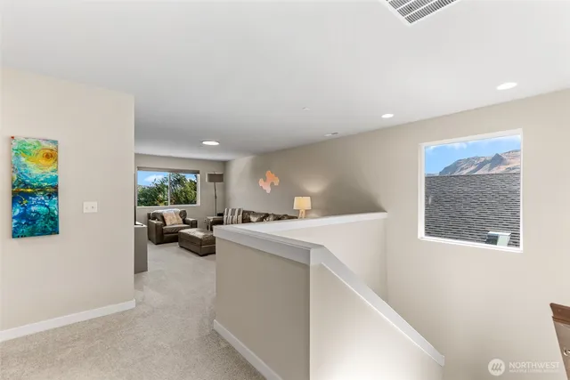 a view of livingroom with washer and dryer