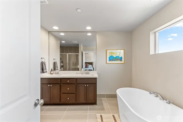 a bathroom with a sink a toilet and a bathtub