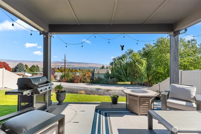 a view of a swimming pool with a patio
