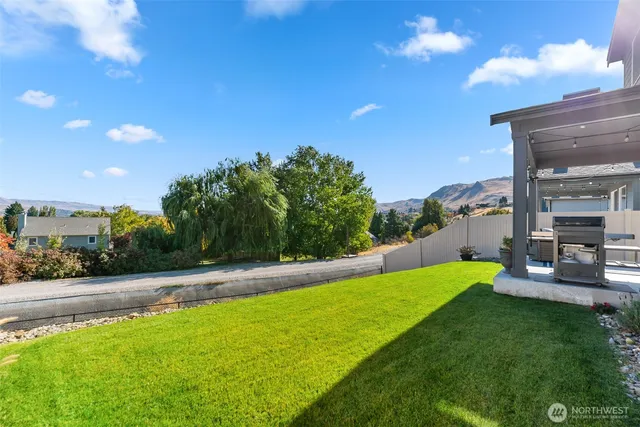 a view of a terrace with a big yard