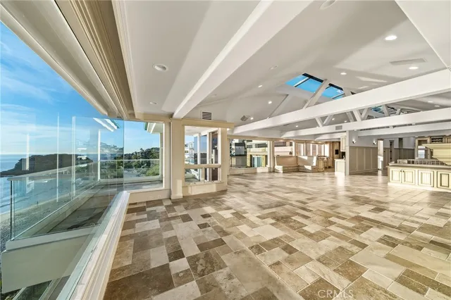 a kitchen with stainless steel appliances granite countertop a sink and cabinets