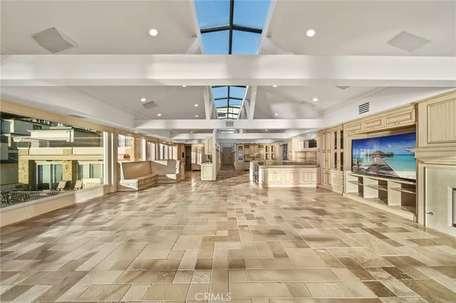 a kitchen with stainless steel appliances granite countertop a stove and a sink
