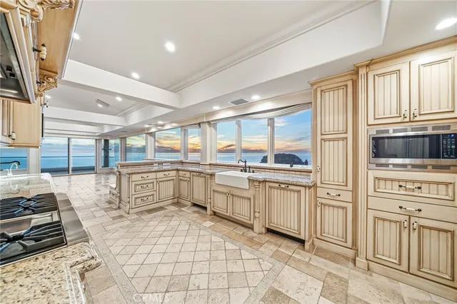 a bedroom with a bed wooden floor and window