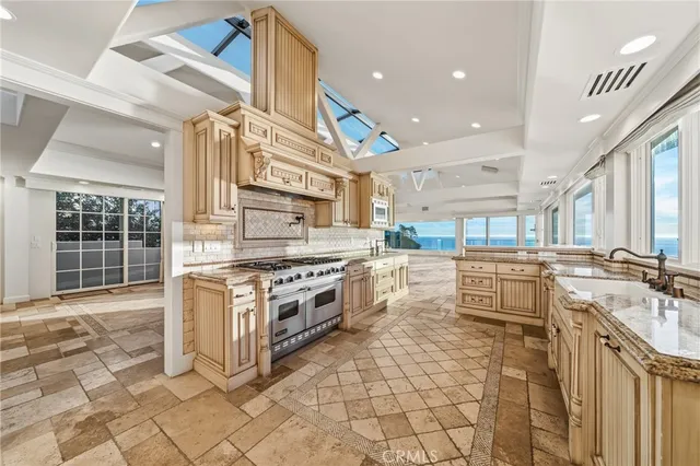 a spacious bathroom with a granite countertop tub sink and mirror