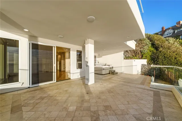 a bathroom with a sink a toilet a mirror and shower