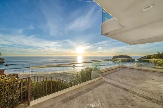 a utility room with sink dryer and washer