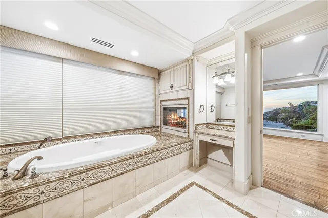 a view of roof deck with an ocean view