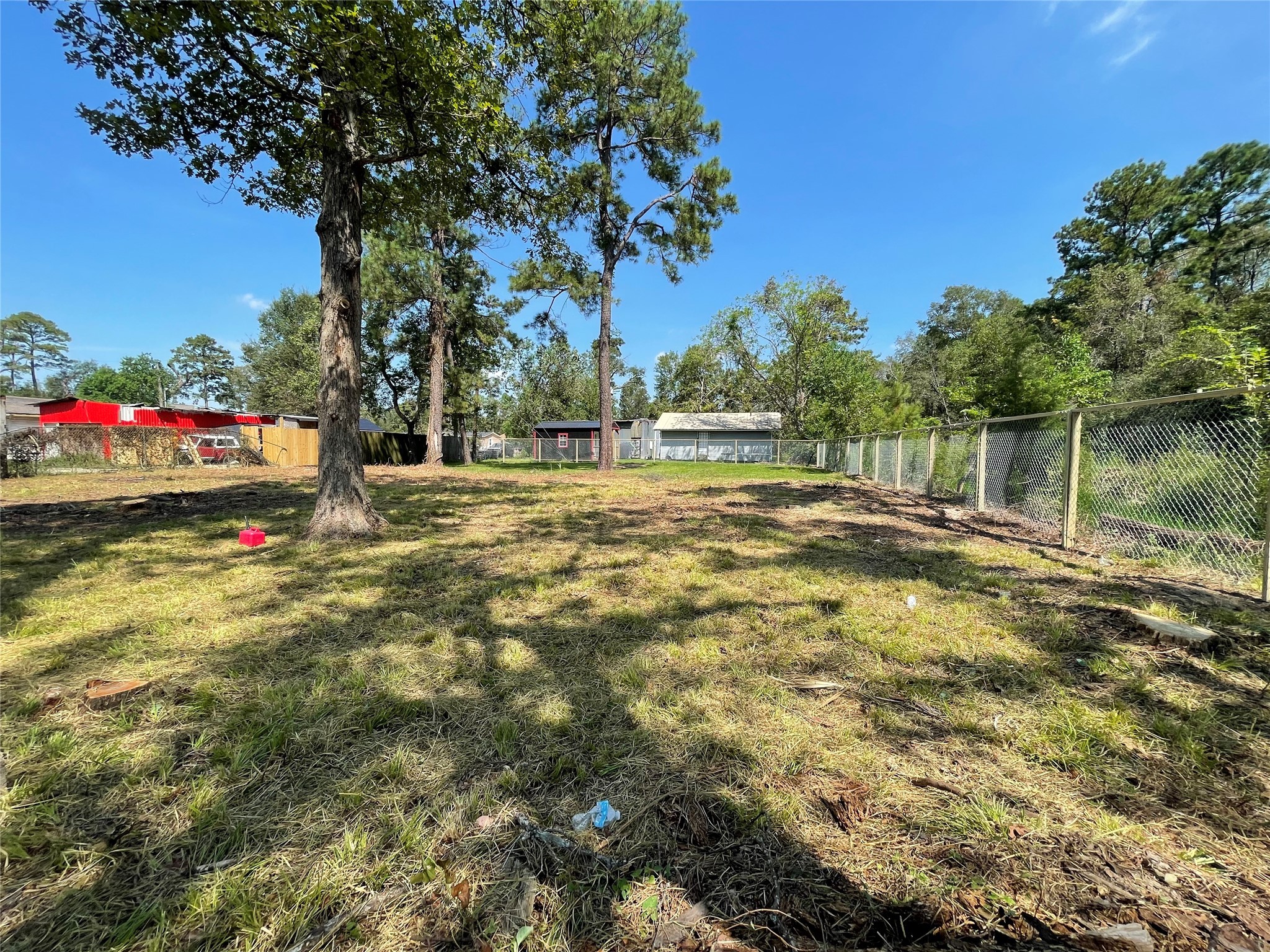 0 Madera Road Houston, TX 77078 - Photo 2 of 7 a view of swimming pool with a yard and trees