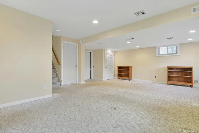 a view of empty room with windows