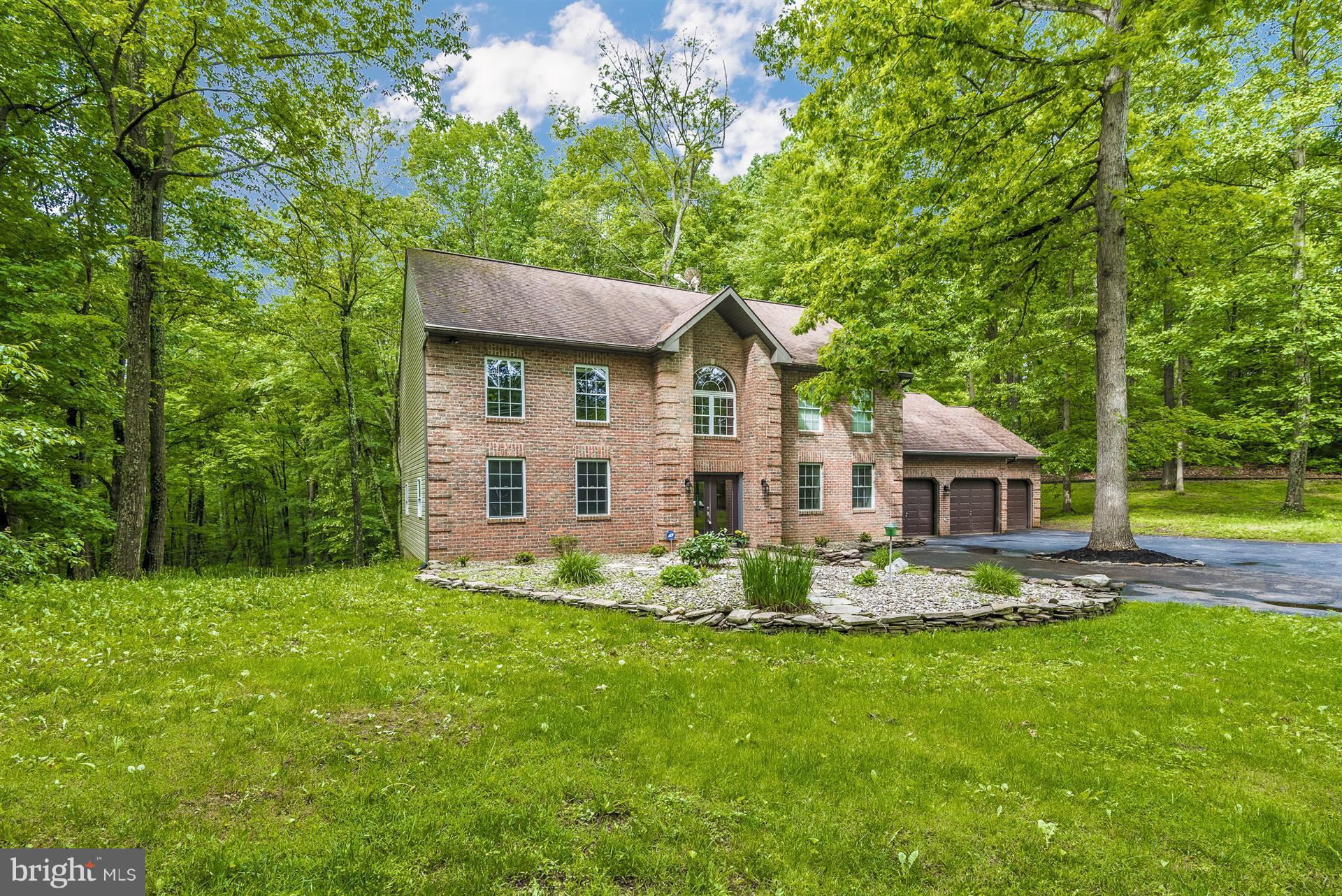 14435 Unionville Road Mount Airy, MD 21771 - Photo 1 of 28 a front view of house with yard and green space