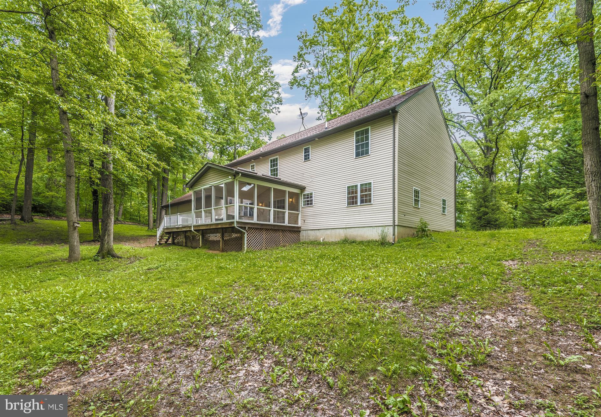 14435 Unionville Road Mount Airy, MD 21771 - Photo 2 of 28 a house view with a garden space