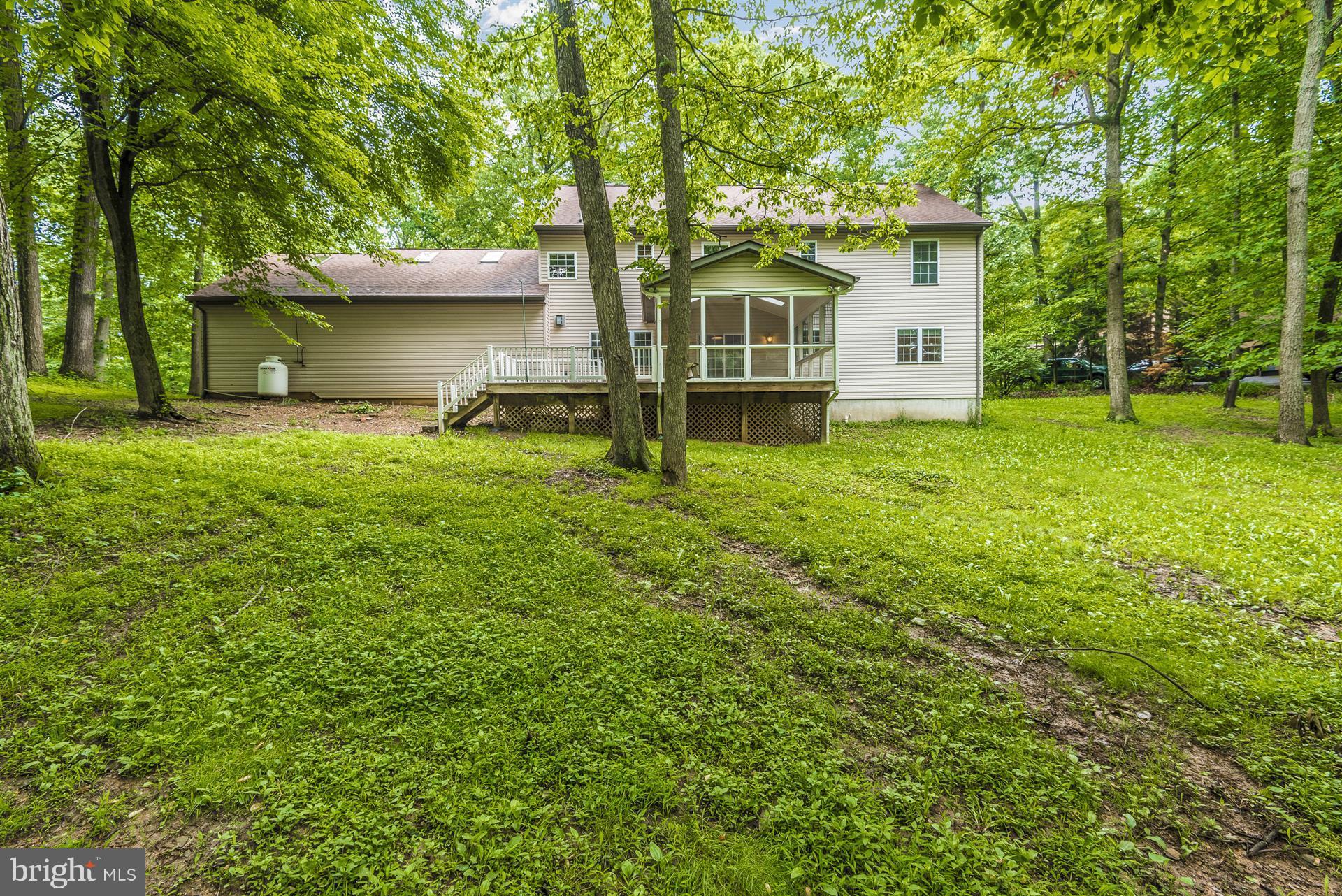 14435 Unionville Road Mount Airy, MD 21771 - Photo 6 of 28 a view of a house with backyard and garden