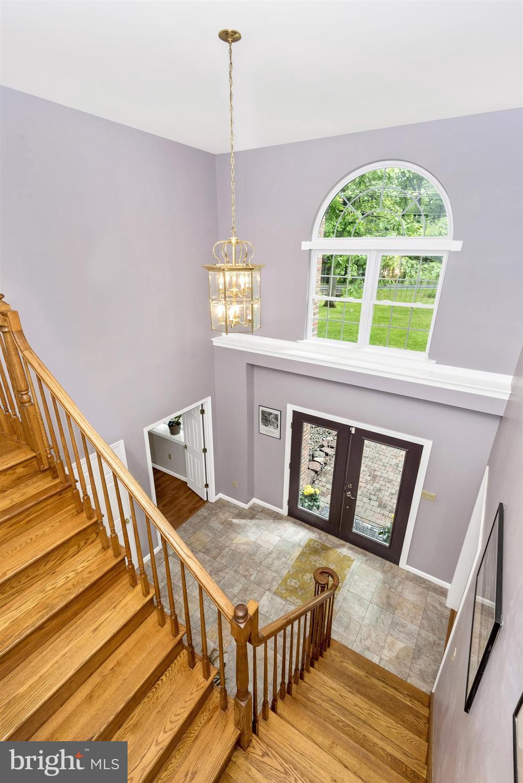14435 Unionville Road Mount Airy, MD 21771 - Photo 8 of 28 a living room with a dining table and a large window