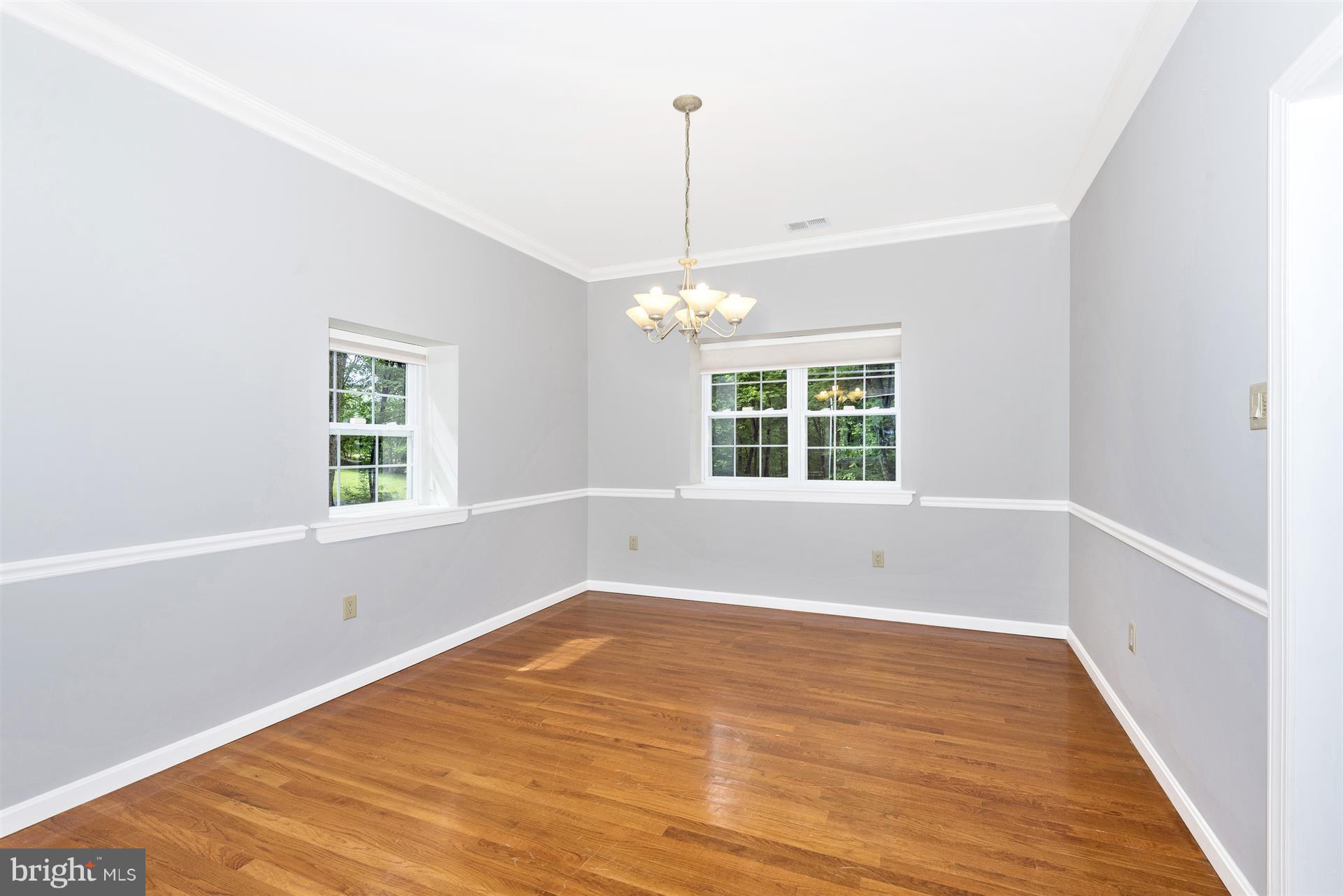 14435 Unionville Road Mount Airy, MD 21771 - Photo 10 of 28 a view of empty room with wooden floor and fan