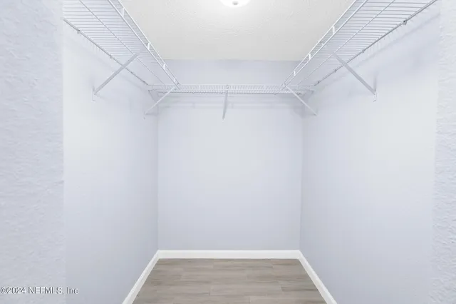 a view of a room with racks on the wall