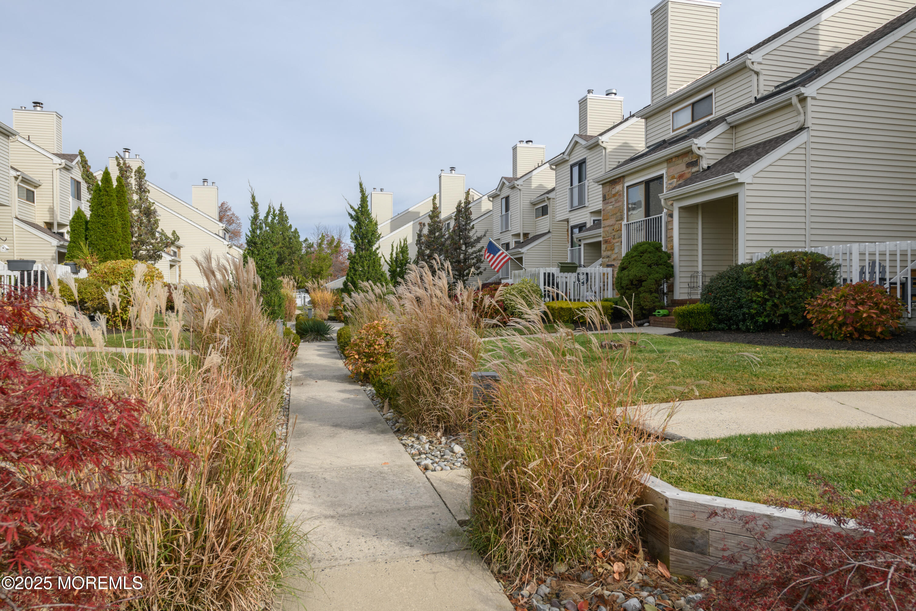 580 Patten Avenue, Unit 31 Long Branch, NJ 07740 - Photo 2 of 30 a view of a pathway with a house in the background