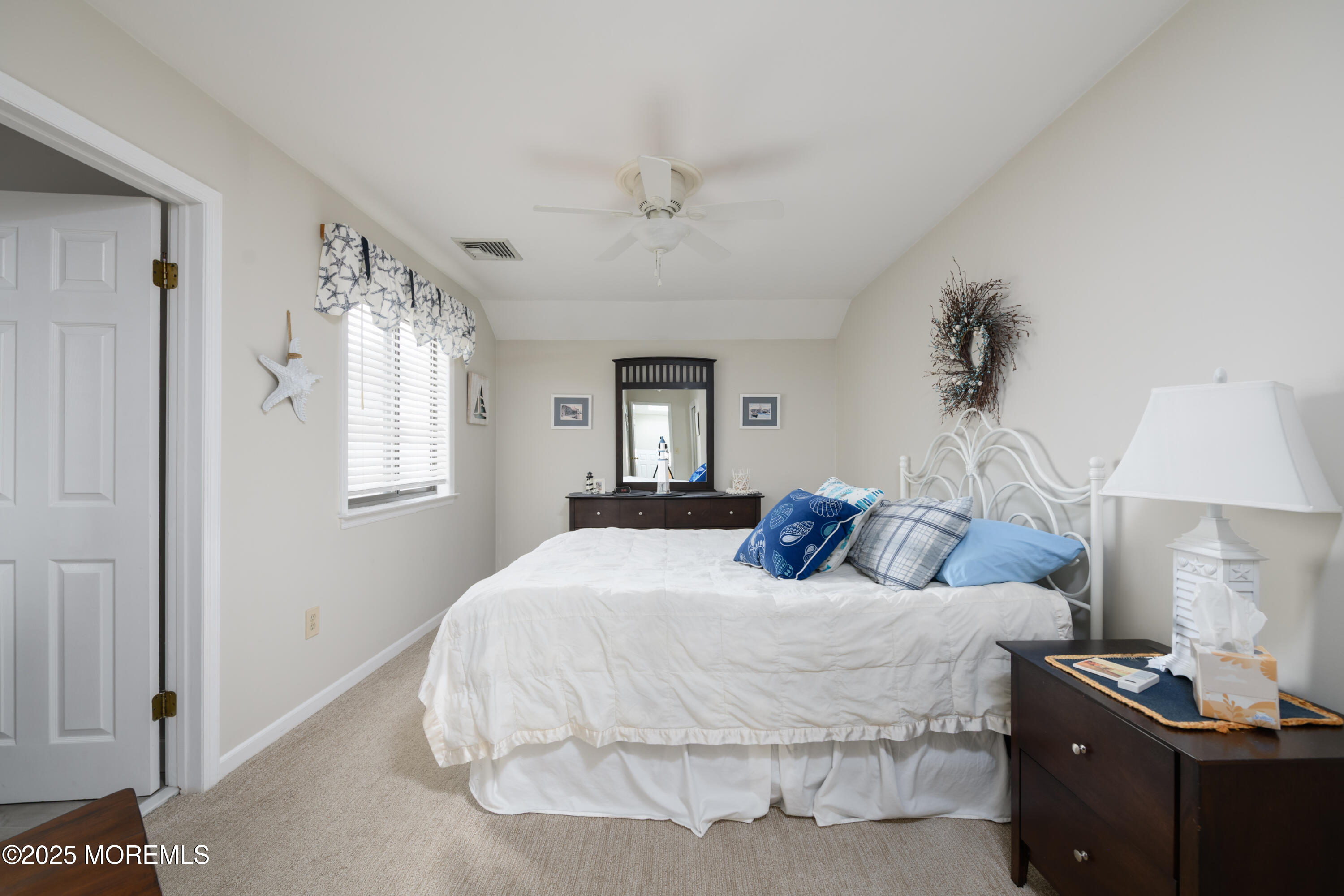 580 Patten Avenue, Unit 31 Long Branch, NJ 07740 - Photo 26 of 30 a bedroom with a bed and a window