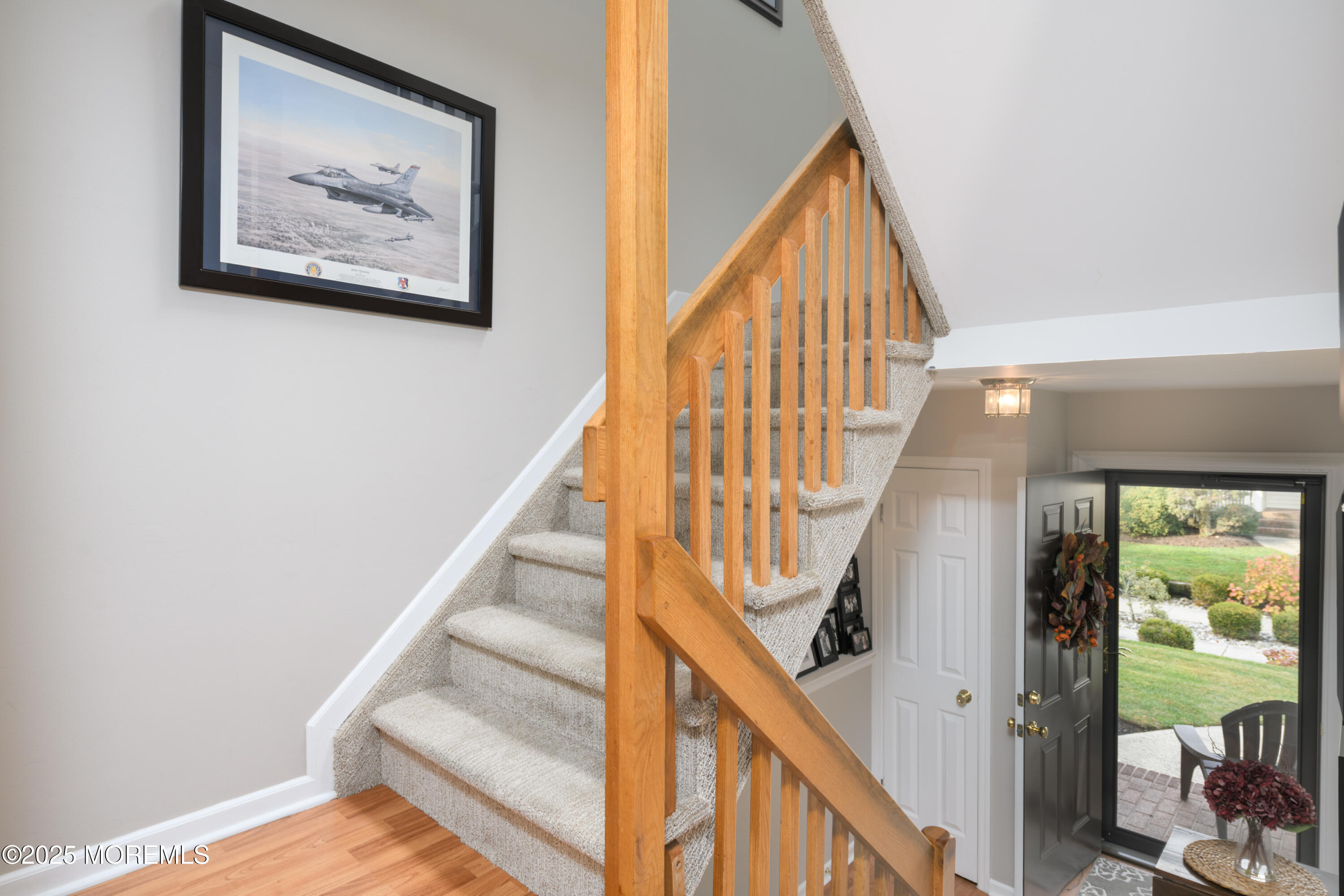 580 Patten Avenue, Unit 31 Long Branch, NJ 07740 - Photo 3 of 30 a view of staircase with wooden floor and a rug