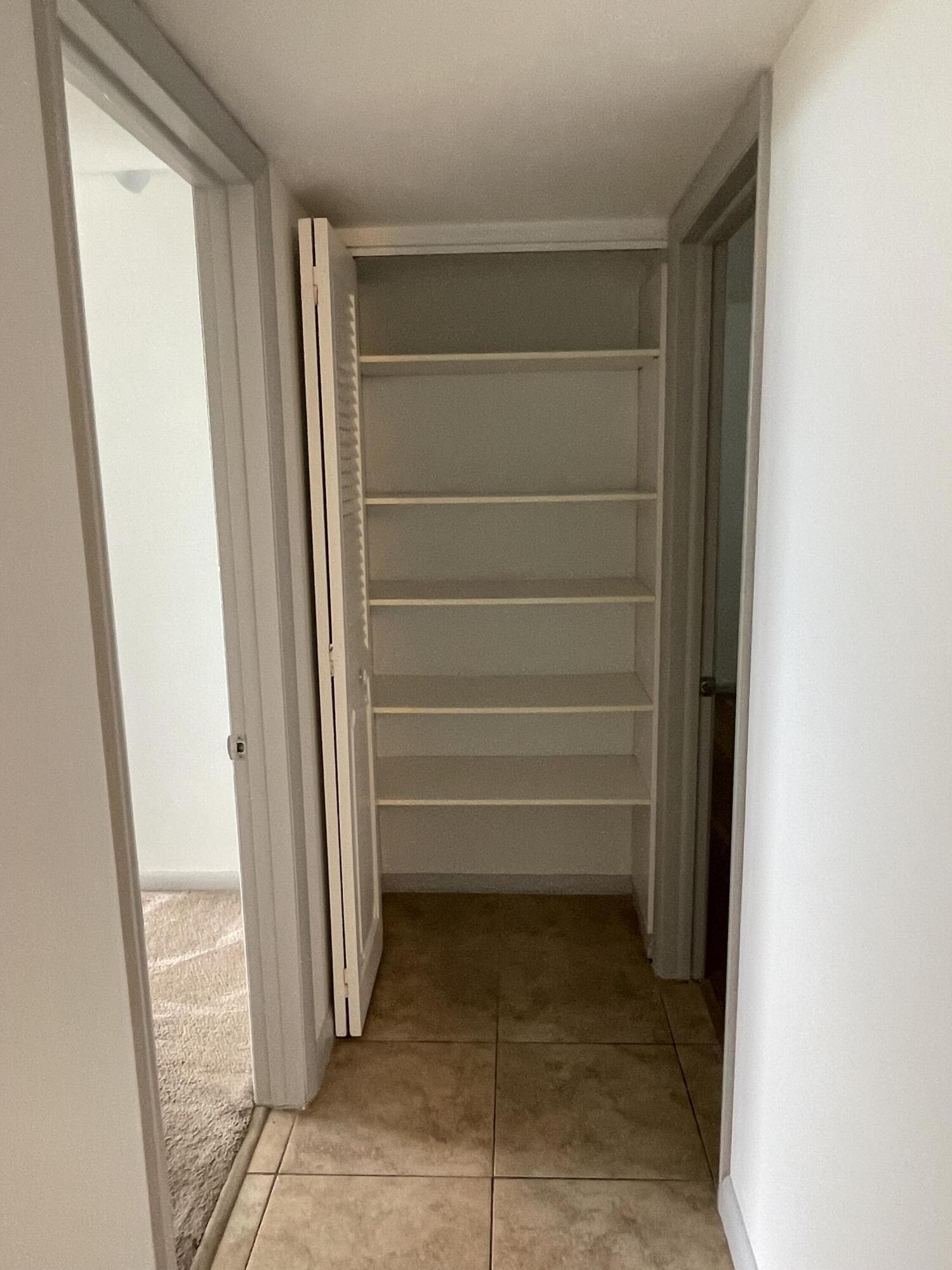 5700 Northwest 2nd Avenue, Unit 711 Boca Raton, FL 33487 - Photo 14 of 29 Linen closet
