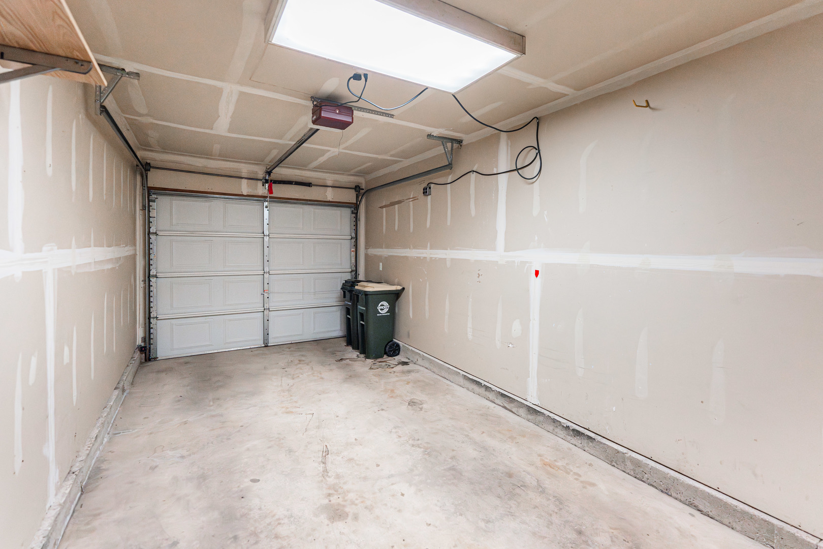 1202 North Red Oak Circle, Unit 2 Round Lake Beach, IL 60073 - Photo 17 of 19 a view of a garage
